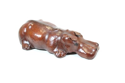 Lot 48 - A modern brown leather clad model of a hippo,...