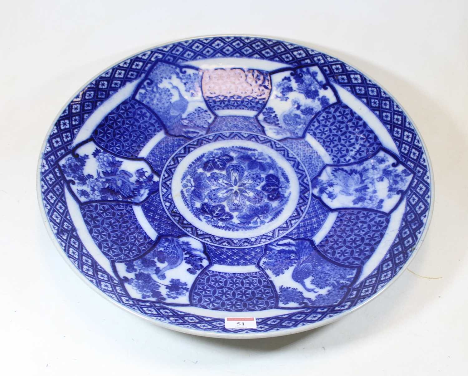 Lot 51 - A 20th century Japanese blue & white stoneware...