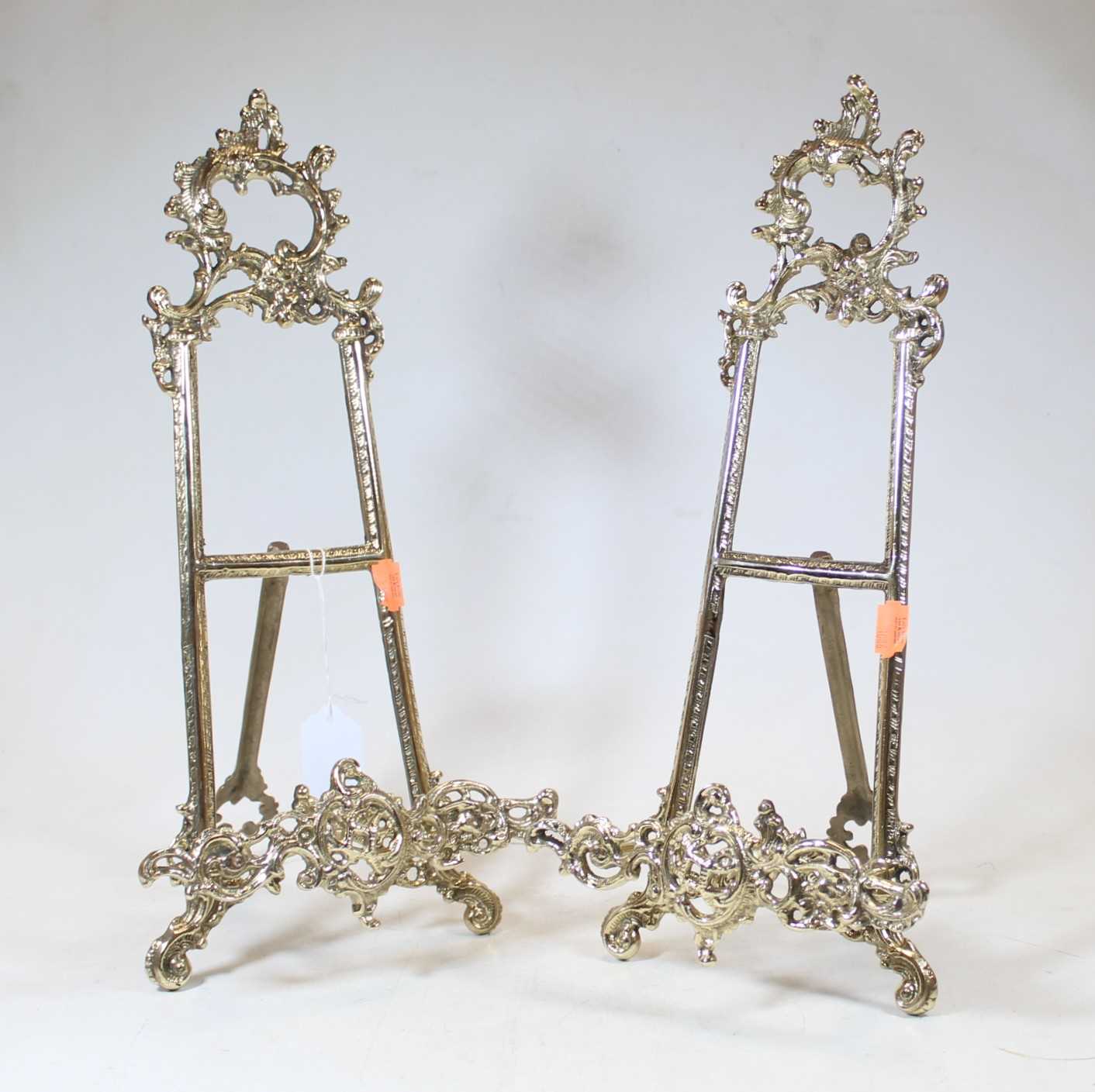 Lot 55 - A pair of modern brass table easels in the...