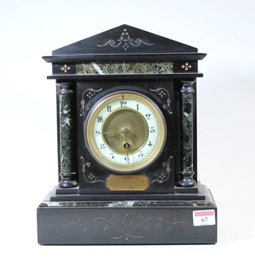 Lot 67 - A Circa 1900 black slate mantel clock, of...