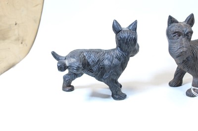Lot 71 - Two cast iron models of Terriers, each shown...