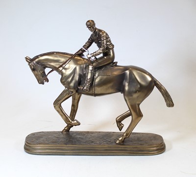 Lot 124 - A modern bronzed figure group of a horse and...