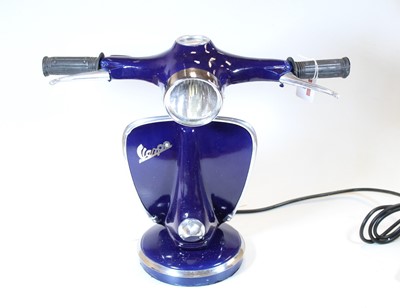 Lot 128 - A modern table lamp in the form of a Vespa...