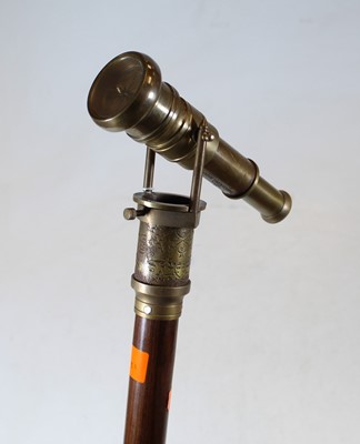 Lot 130 - A reproduction brass and hardwood walking...