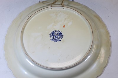 Lot 140 - A pair of Dutch Delft style chargers, each...