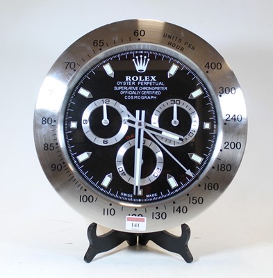 Lot 141 - A Rolex style wall clock, quartz movement, dia....