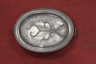 Lot 151 - A 19th century pewter warming meat dish,...