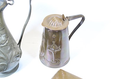 Lot 177 - An Art Nouveau copper hot water jug by J...