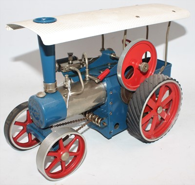 Lot 1 - Wilesco steam tractor, blue body, white roof,...