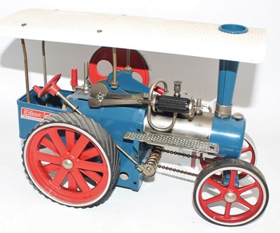 Lot 1 - Wilesco steam tractor, blue body, white roof,...