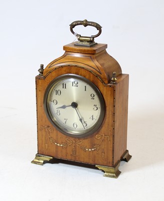 Lot 248 - An Edwardian satinwood and inlaid mantel clock,...