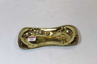 Lot 254 - A pair of Victorian brass wick scissors on...