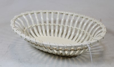 Lot 197 - A 19th century cream ware basket with...