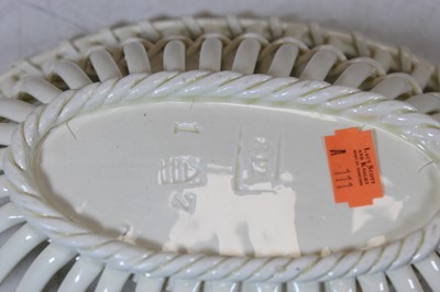 Lot 197 - A 19th century cream ware basket with...