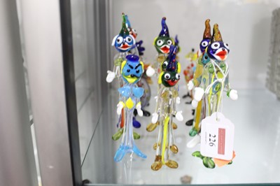Lot 226 - A collection of 19 Murano glass figures of...