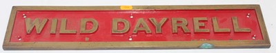 Lot 23 - Brass sign to read "Wild Dayrell", red back...