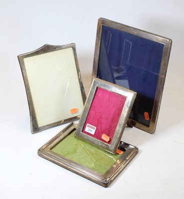 Lot 284 - A modern silver clad easel photograph frame,...