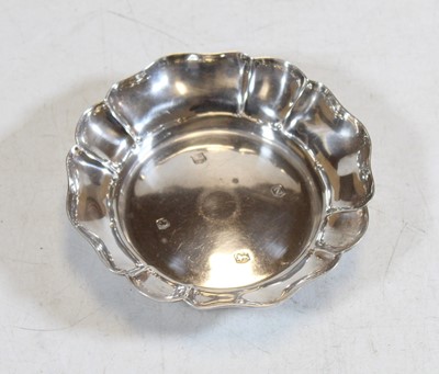 Lot 334 - A modern silver dish, of scalloped circular...