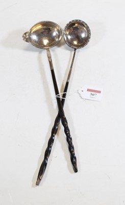 Lot 307 - A 19th century white metal toddy ladle having...