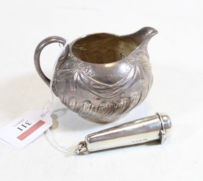 Lot 311 - A Victorian silver cream jug repoussee...