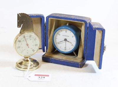 Lot 329 - An Alprosa travel alarm clock, having enamel...
