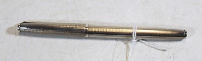 Lot 330 - A silver cased ball point pen, the cap and...