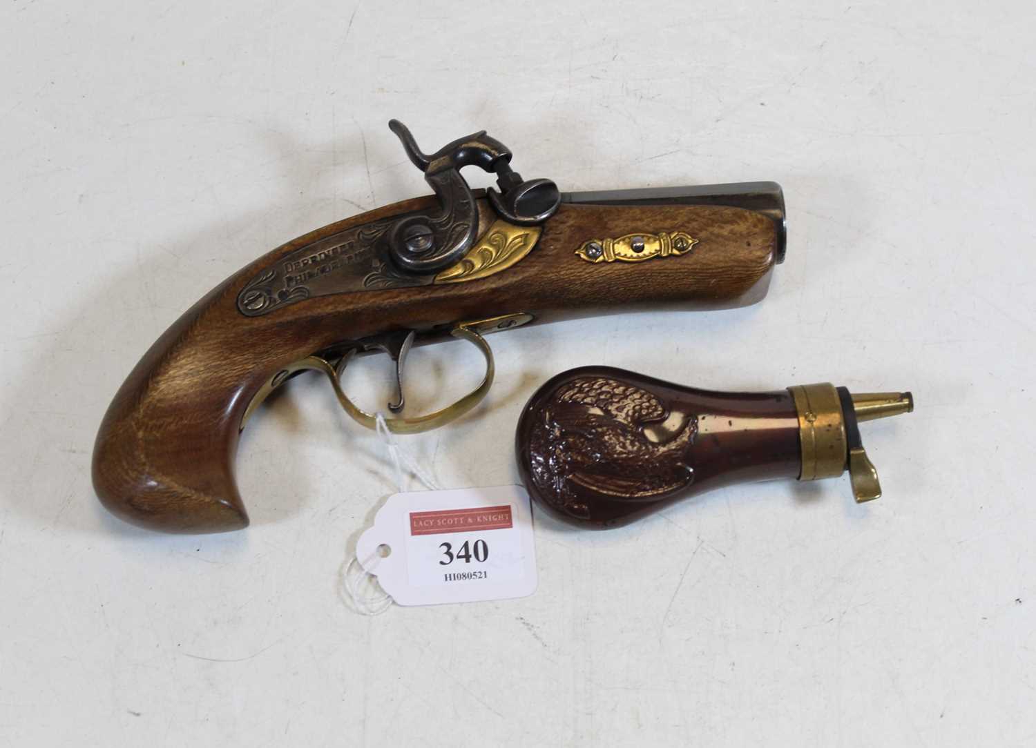 Lot 340 - A reproduction percussion cap pistol, the lock...