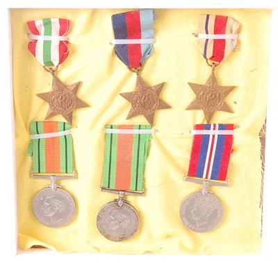 Lot 2102 - A collection of six WW II medals to include...