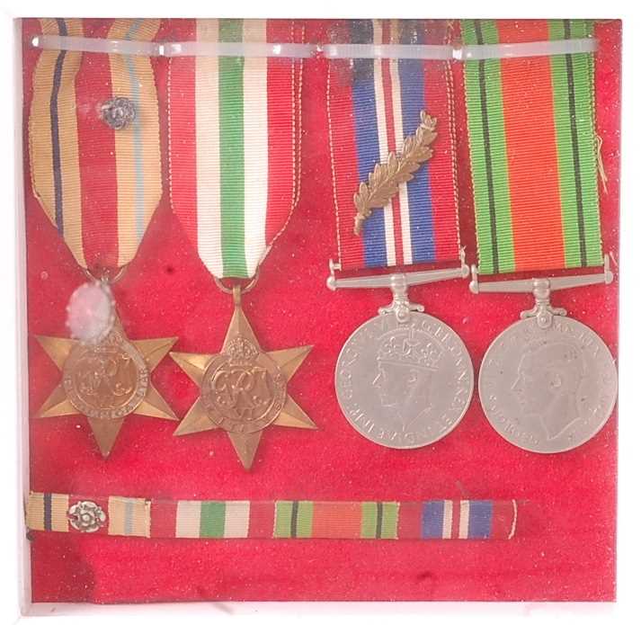 Lot 2114 - A group of four WW II medals to include Africa...