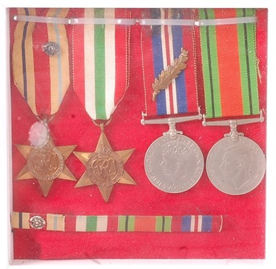 Lot 2114 - A group of four WW II medals to include Africa...