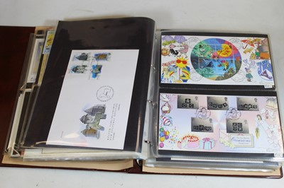Lot 73 - An album of first day covers and medal covers...