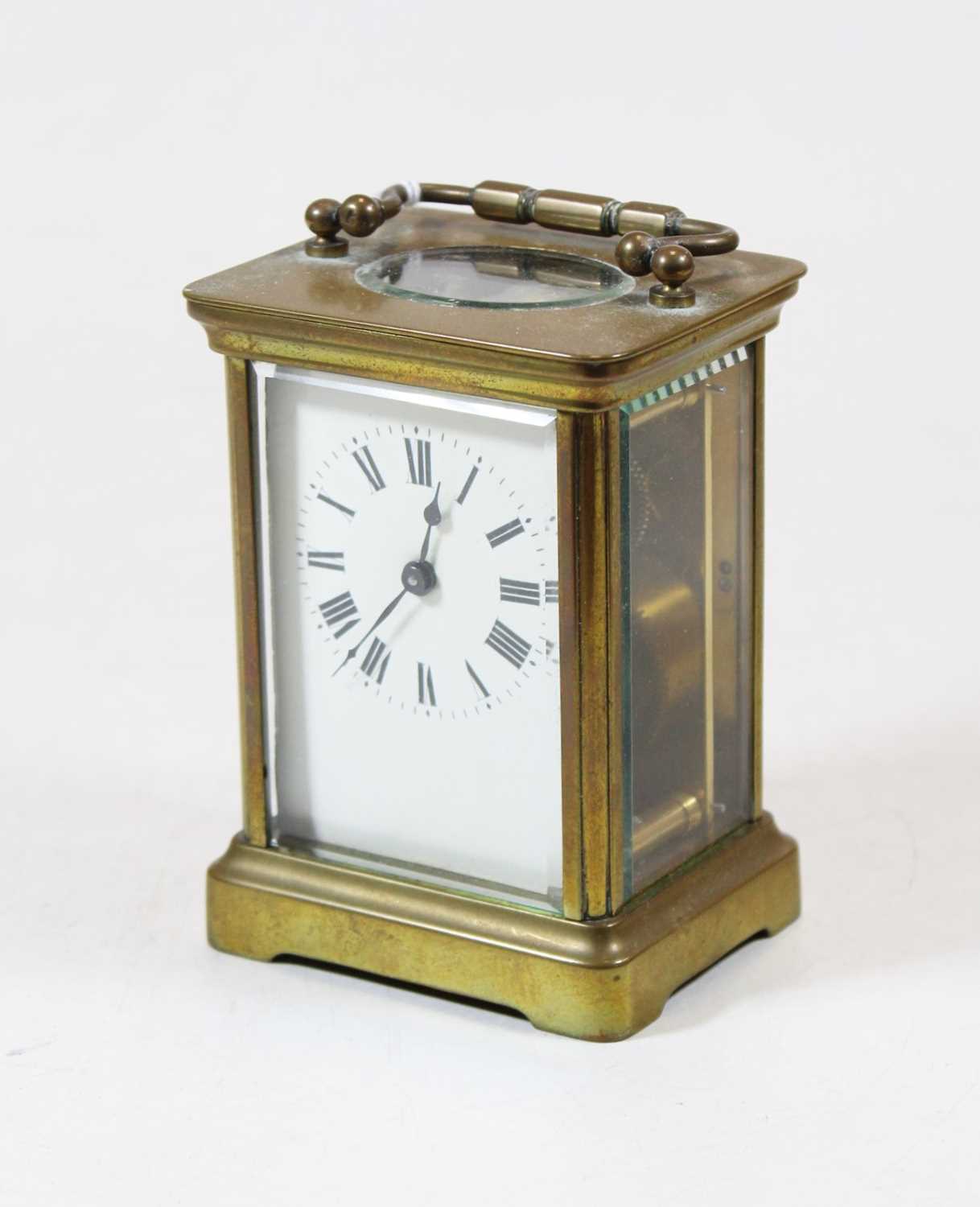 Lot 32 - A French lacquered brass carriage clock,...