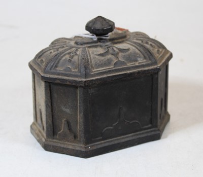Lot 215 - A Victorian cast iron tobacco box and cover,...