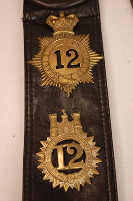 Lot 2188 - A collection of cap badges and insignia being...