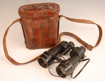 Lot 2411 - A pair of WW II private purchase binoculars,...