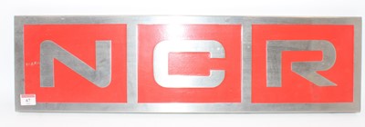 Lot 67 - Late 20th century alloy "NCR" sign, red ground...
