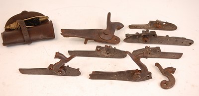 Lot 2397 - A collection of gun parts and tools to include...