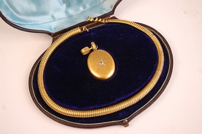 Lot 3086 - A yellow metal oval diamond set locket,...