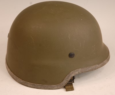 Lot 2418 - A German M826 combat helmet with leather liner...