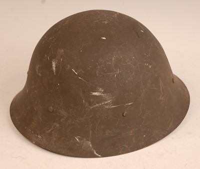 Lot 2427 - A Swedish M1926 steel helmet with leather...