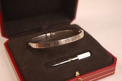 Lot 3084 - A Cartier 18ct white gold 'Love' bangle,...