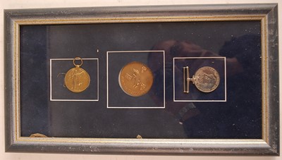 Lot 2146 - A WW I Victory medal, name partially erased,...