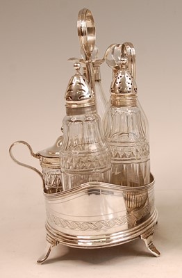 Lot 3052 - A George III silver five-bottle cruet, of oval...
