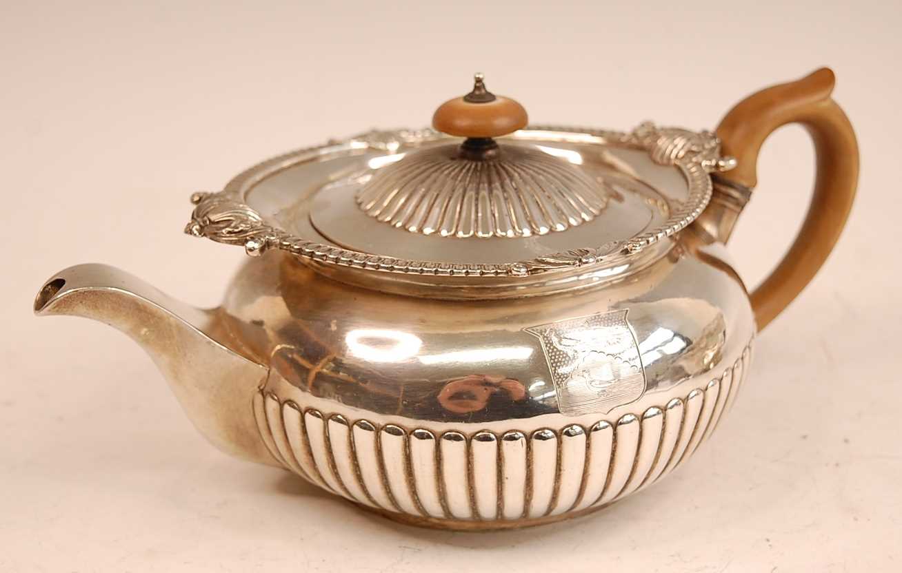 Lot 3054 - A George III silver teapot, of half-reeded...