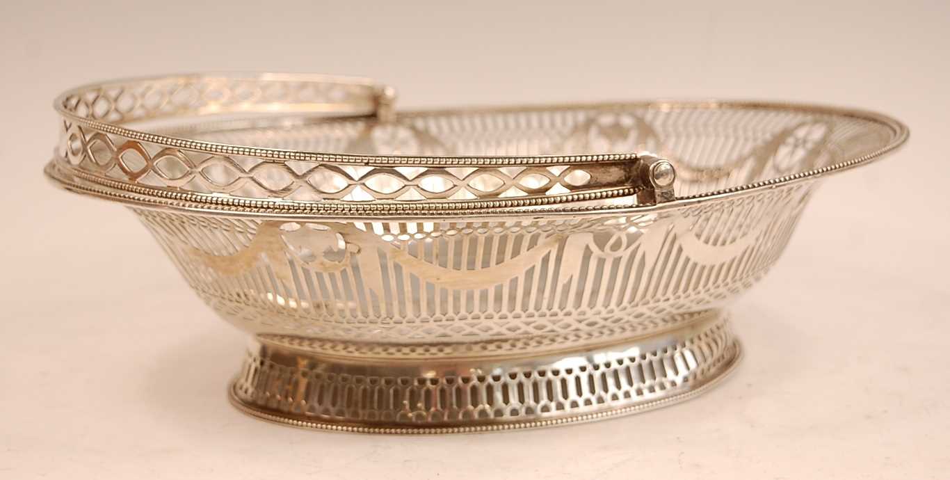 Lot 3055 - A George III silver basket, of beaded oval...