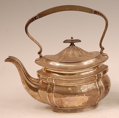 Lot 3056 - A George V silver tea kettle, having ebony...