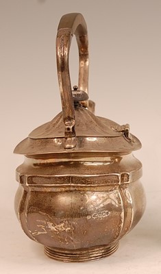 Lot 3056 - A George V silver tea kettle, having ebony...