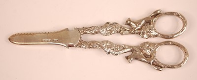 Lot 3061 - A pair of silver grape scissors, the handles...