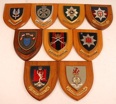Lot 2380 - A collection of Regimental wall plaques to...