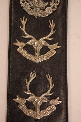 Lot 2192 - A collection of Highland Regiment glengarry...